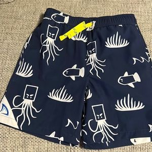 Dry Fins kids swim trunks with a comfort liner size medium NWOT never worn